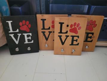 Set van 4 kapstokborden  beschikbaar voor biedingen