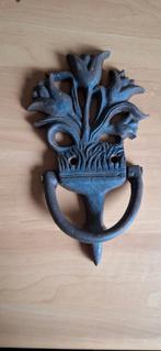 Deurklopper gietijzer, Ophalen