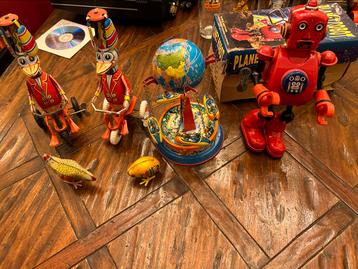 Verzameling antiek blikken speelgoed