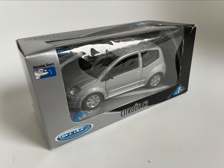 model Citroën C2 zilverkleurig grijs, 1/36 welly in doo, Hobby en Vrije tijd, Modelauto's | 1:32, Zo goed als nieuw, Auto, Ophalen of Verzenden