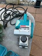 Makita elektrische schaafmachine, Ophalen of Verzenden, Zo goed als nieuw, 600 tot 1200 watt, Bandschuurmachine