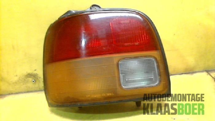 Achterlicht links van een Daihatsu Cuore, Auto-onderdelen, Verlichting, Daihatsu, Gebruikt, 6 maanden garantie, 12 maanden garantie