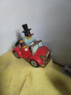 14119) mooie  spaarpot  eend in auto  lang 19cm, Ophalen of Verzenden, Zo goed als nieuw, Steen, Aardewerk of Keramiek, Dier