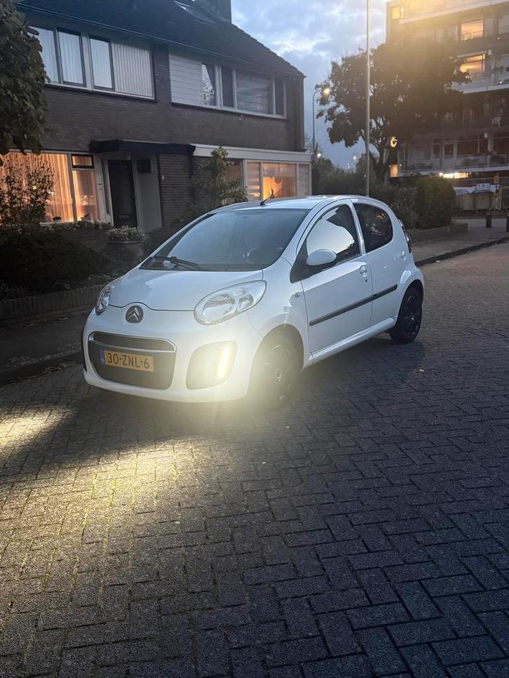 Citroën C1 1.0i 68PK 5D 2012 Wit APK 12/26, Auto's, Citroën, Particulier, C1, Airbags, Airconditioning, Alarm, Bluetooth, Boordcomputer
