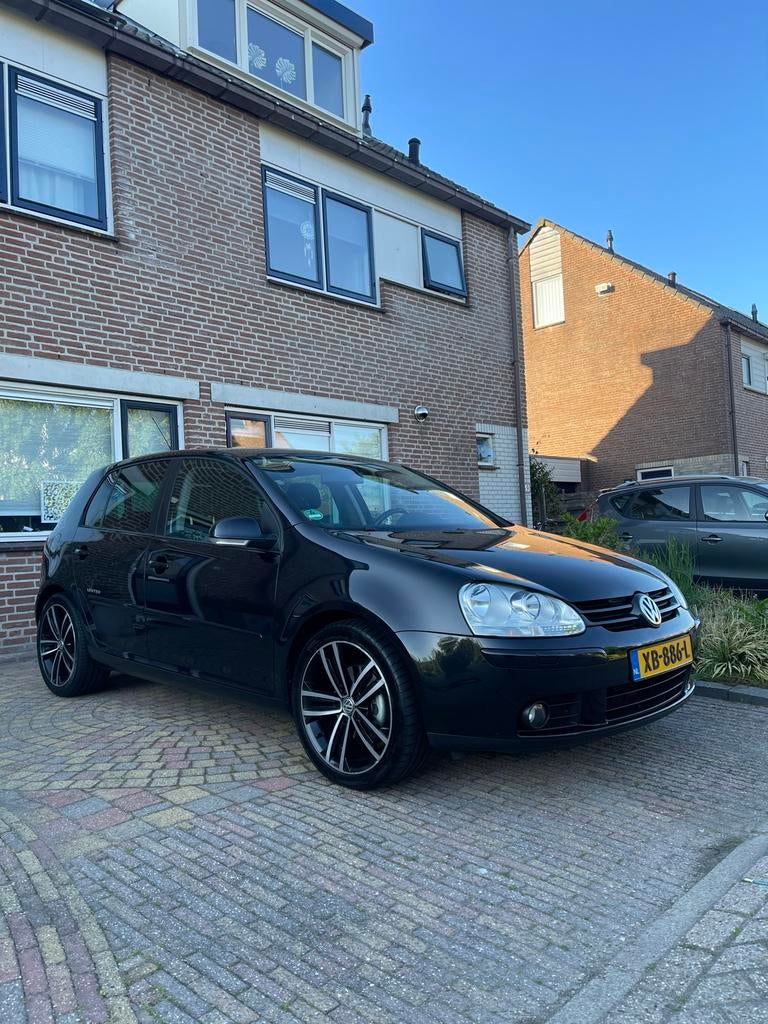 Volkswagen Golf 1.4 TSI 140 pk 2008 Zwart, Auto's, Volkswagen, Voorwielaandrijving, Stof, Navigatiesysteem, 4 cilinders