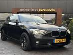 BMW 1-serie 114i Business+ Leder Navi Parkeersensoren Mistla, Euro 5, Gebruikt, Zwart, 4 cilinders