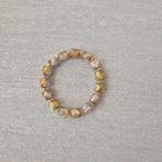 Grijs / goud kralen armband met elastiek, Nieuw, Ophalen of Verzenden, Elastiek, Grijs