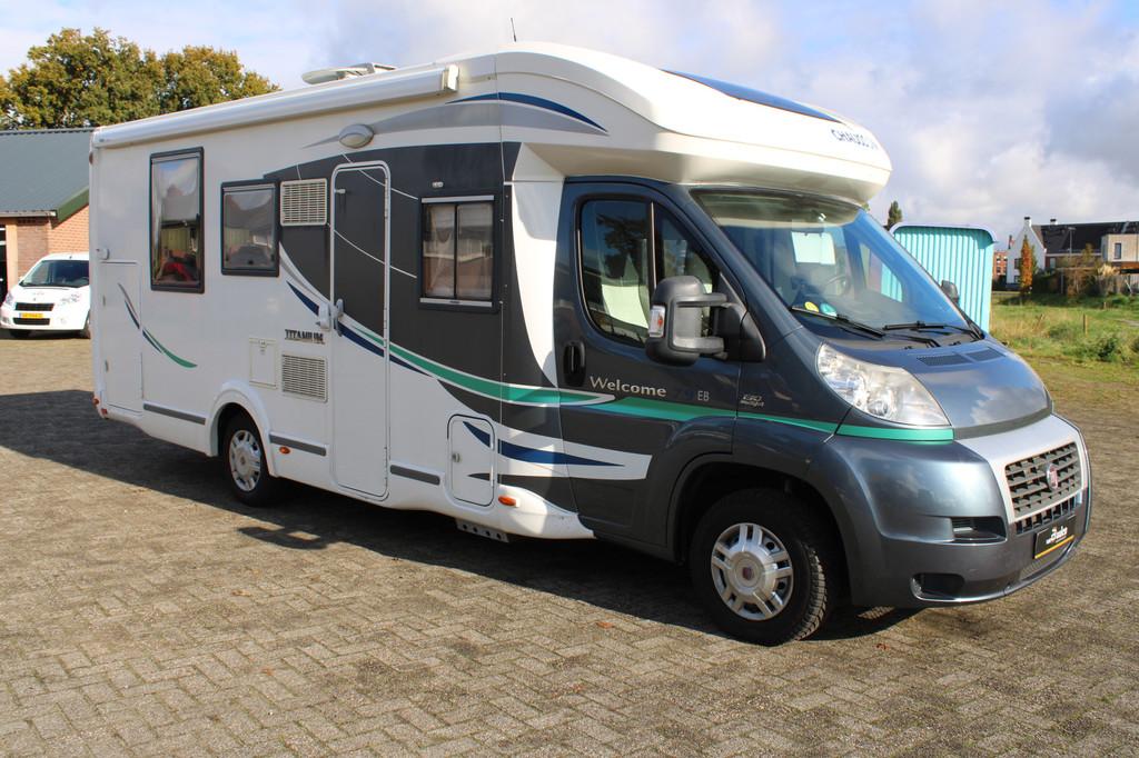Chausson 79 EB TITANIUM HEFBED QUEENSBED NAVI 62000KM!, Fiat, Caravans en Kamperen, Ringverwarming, Douche, 6 tot 7 meter, Half-integraal