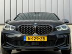 BMW 1-serie M135i 306PK xDrive High Executive Head-UP Leer, Auto's, 1998 cc, Gebruikt, 4 cilinders, Zwart