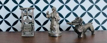 Tinnen figuurtjes: drukpers, tekkel & heilige beschikbaar voor biedingen