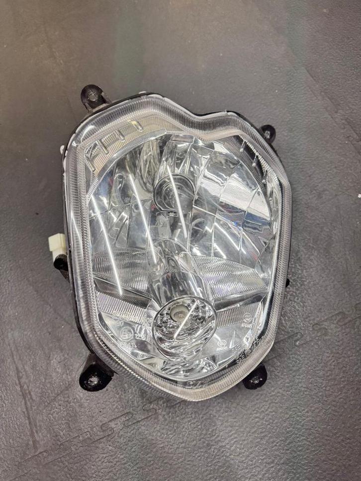 Koplamp SYM Xpro / orbit 2020, Fietsen en Brommers, Brommeronderdelen | Scooters, Gebruikt, SYM, Koplamp, Ophalen of Verzenden