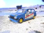 1/24 MG Metro - Bburago rally #77 in nieuwstaat, Gebruikt, Ophalen of Verzenden, Bburago