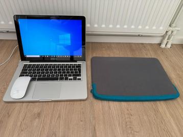 MacbookPro (zonder hardeschijf en oplader) met magic mouse beschikbaar voor biedingen