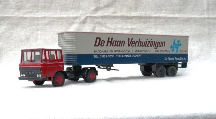 Lion Daf 2600 + oplegger De Haan verhuizingen., Hobby en Vrije tijd, Modelauto's | 1:50, Gebruikt, Bus of Vrachtwagen, Lion Toys