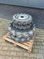 Nieuwe banden op velg mini trekker 4x4, Ophalen
