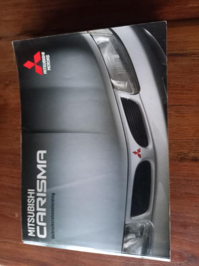Instruktieboek  MITSUBISHI CARISMA 1997  NL, Ophalen of Verzenden