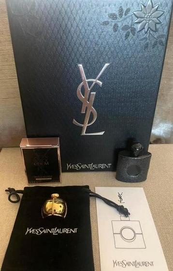 Authentiek goudkleurige YSL broche,Black Opium miniatuur edp beschikbaar voor biedingen