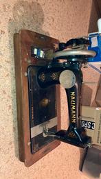 Nauman Regina naaimachine, Ophalen