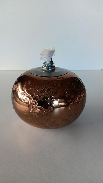 Oliebrander bronskleurig.
 beschikbaar voor biedingen