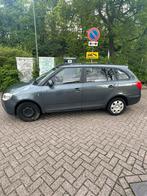 Skoda Fabia 1.2 44KW Combi 2009 Grijs, Auto's, Skoda, Origineel Nederlands, Te koop, Zilver of Grijs, 5 stoelen