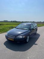 Volvo V70 2.4 D5 AUT 2004 Blauw, Auto's, 1800 kg, Beige, Blauw, 163 pk