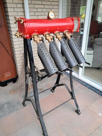 Oude Grolsch bierflessen spoeler / ontsmetter uit Groenlo beschikbaar voor biedingen