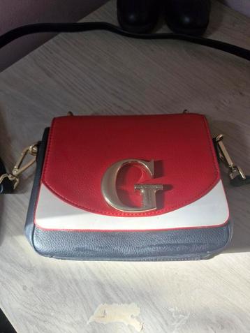 Guess handtasje  beschikbaar voor biedingen