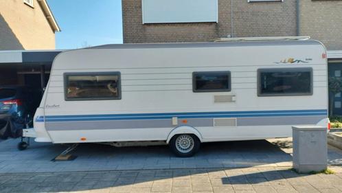 Unieke Hobby 560 met voortent, luifel en inboedel, Caravans en Kamperen, Caravans, Particulier, Rondzit, Hobby, Vast bed, Koelkast