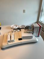 Werkende Wii spelcomputer + spellen + overig materiaal, Ophalen of Verzenden, Zo goed als nieuw, Met 2 controllers