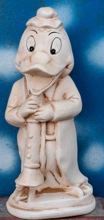 Donald Duck met klarinet. Biscuit keramiek.  26 cm. beschikbaar voor biedingen