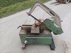 2 grote ijzerzaag machines, Ophalen