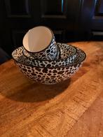 Setje luipaard servies, Ophalen