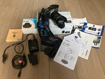 MFT Olympus Pen E-P3 met 14-150mm Lens, accessoires en doos beschikbaar voor biedingen
