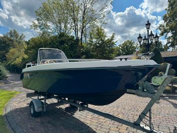 Console boot met motor en trailer (vaarklaar) beschikbaar voor biedingen