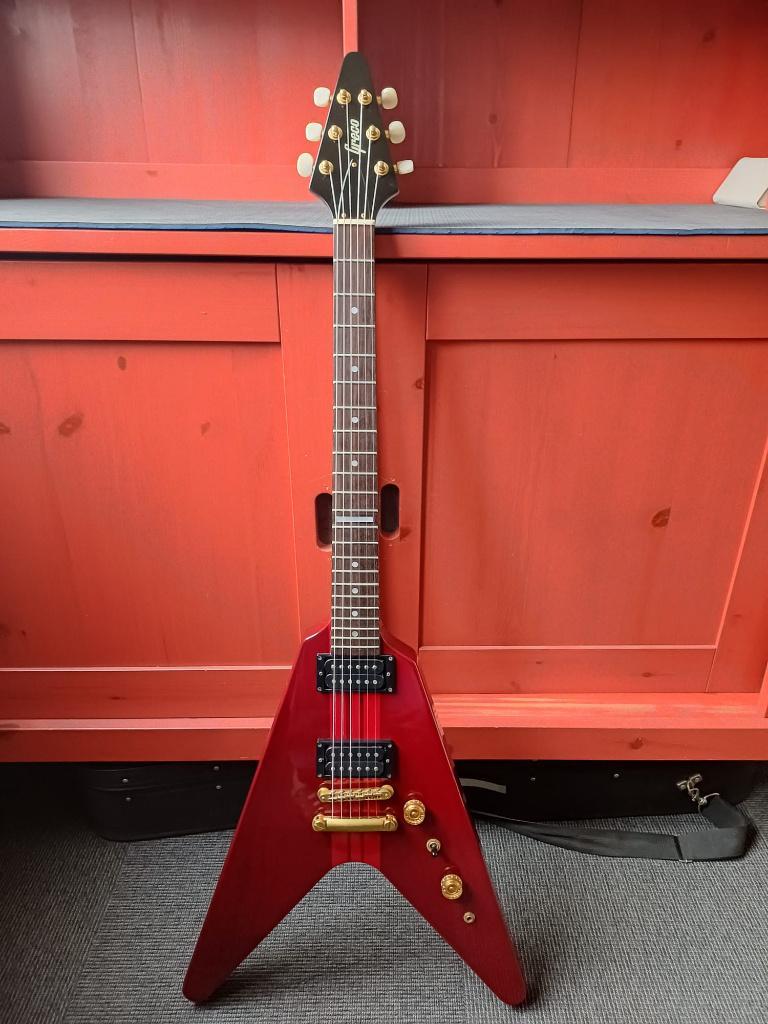 ≥ Greco GV-90 Flying V Japan 1996 See trough red, Neck-through