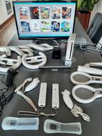 Wii met spellen zoals Mario kart black wii party wii sports, Ophalen of Verzenden, Zo goed als nieuw, Met 2 controllers