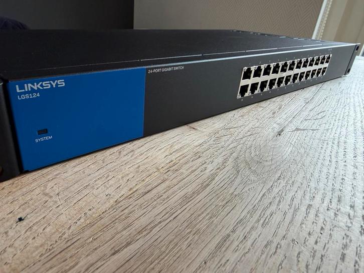Linksys LGS124 24-Poorts Gigabit Switch, Computers en Software, Netwerk switches, Gebruikt, Ophalen of Verzenden