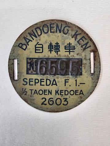 Japans voertuigen belastingplaatje Bandoeng. beschikbaar voor biedingen