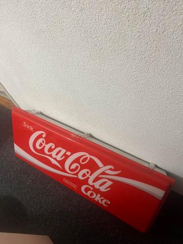Lichtbak van coca cola beschikbaar voor biedingen
