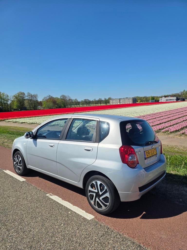 Chevrolet Aveo 1.4 16V 4D 2009 Grijs, Auto's, Voorwielaandrijving, 40 €/maand, Aveo, 400 kg