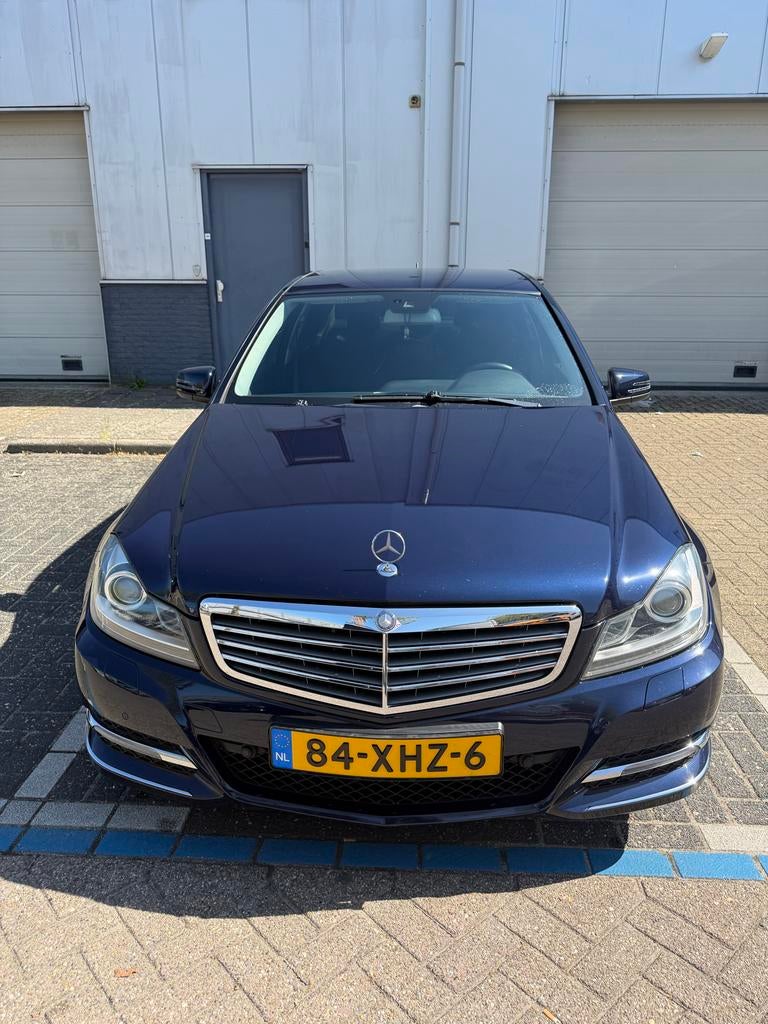 Mercedes-Benz C-Klasse 1.6 C180. Sedan AUT 2012 Blauw, Euro 5, Achterwielaandrijving, Blauw, 75 €/maand