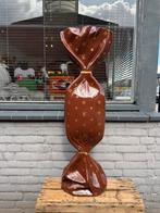 Grote Louis Vuitton snoep sculptuur reclame, Ophalen