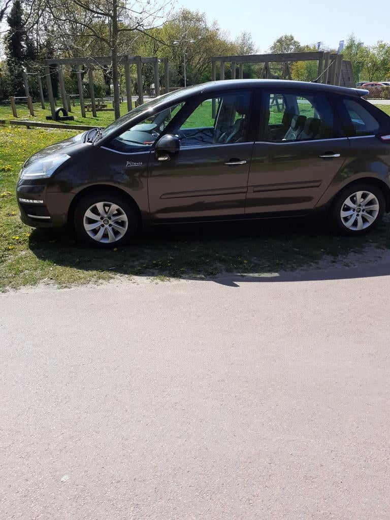 Te koop puntgave picasso geen schade bekleding als nieuw, Auto's, Citroën, Zwart, 4 cilinders, Bruin, 115 pk