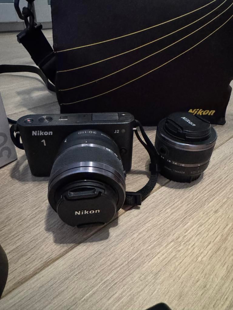 Nikon 1 complete set met 2 lenzen en 2 accu's, Audio, Tv en Foto, Fotocamera's Digitaal, Gebruikt, Compact, Ophalen of Verzenden