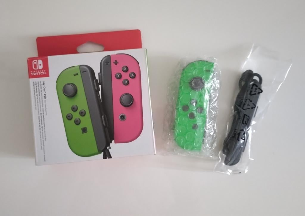 Nintendo Switch joycon/ controller groen met polsband, Ophalen of Verzenden, Zo goed als nieuw, Switch