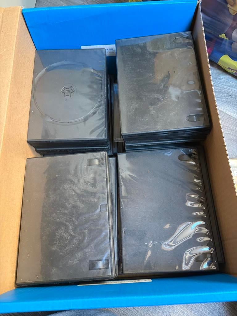 Doos met LEGE dvd hoezen, Alle leeftijden, Ophalen, Zo goed als nieuw