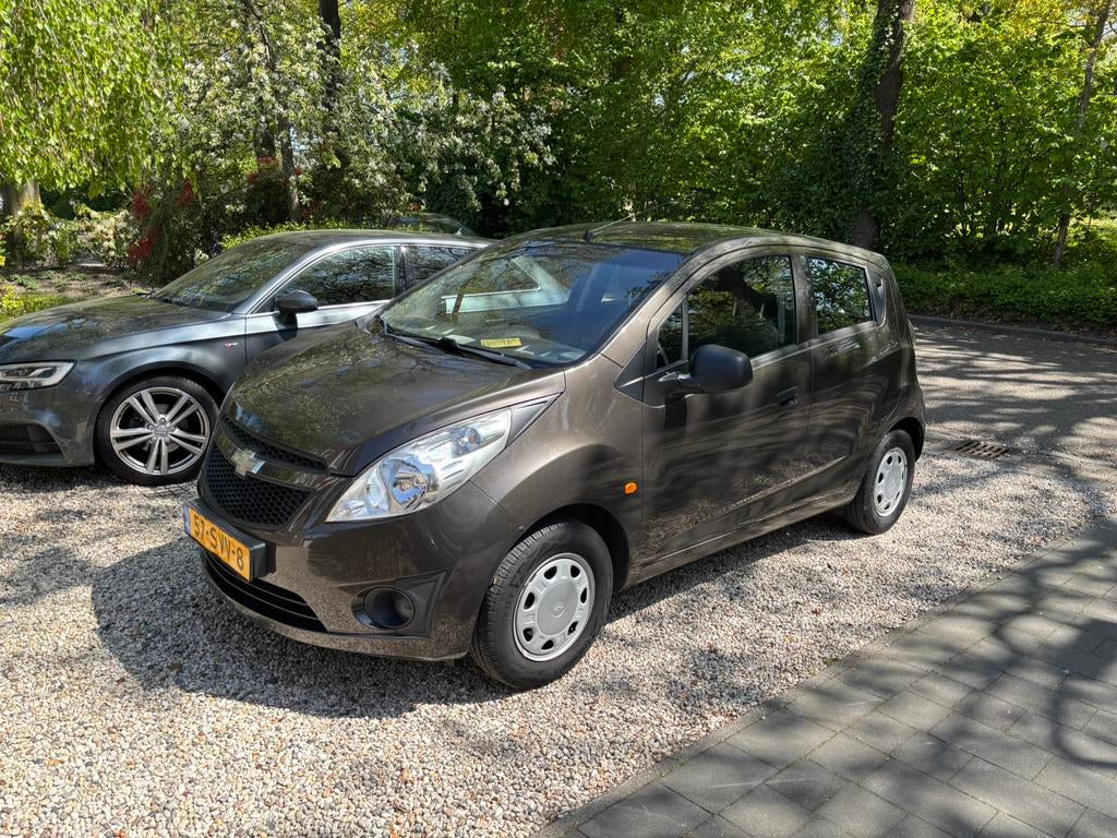 Chevrolet Spark 1.0 Benzine 2011 Bruin, Voorwielaandrijving, 839 kg, Stof, 4 cilinders