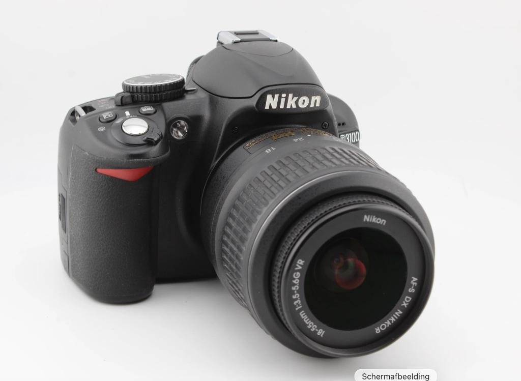 Nikon D3100 incl 35-80mm Lens en tas, 14 Megapixel, Spiegelreflex, Ophalen of Verzenden, Zo goed als nieuw