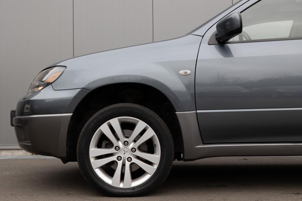 Mitsubishi Outlander 2.4 Sport | 4WD | PANO | TREKHAAK, Auto's, Mitsubishi, Automaat, 4 cilinders, 1535 kg, Bedrijf