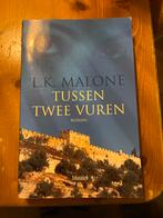 Tussen Twee Vuren - L.K. Malone, Ophalen of Verzenden, Gelezen, Nederland
